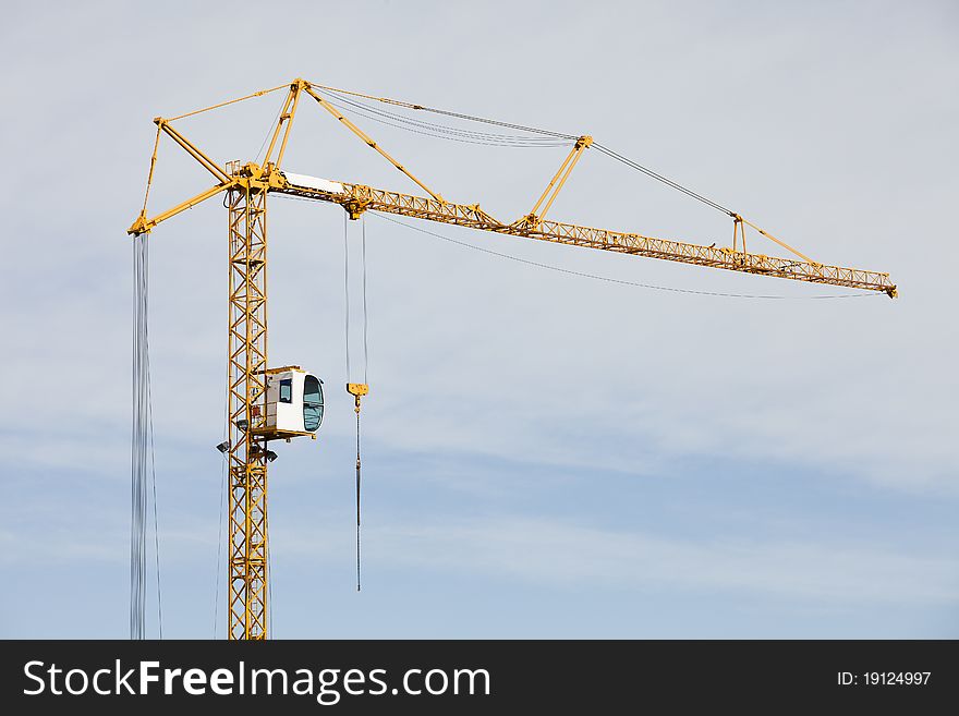 Construction Crane on cloudscaped sky