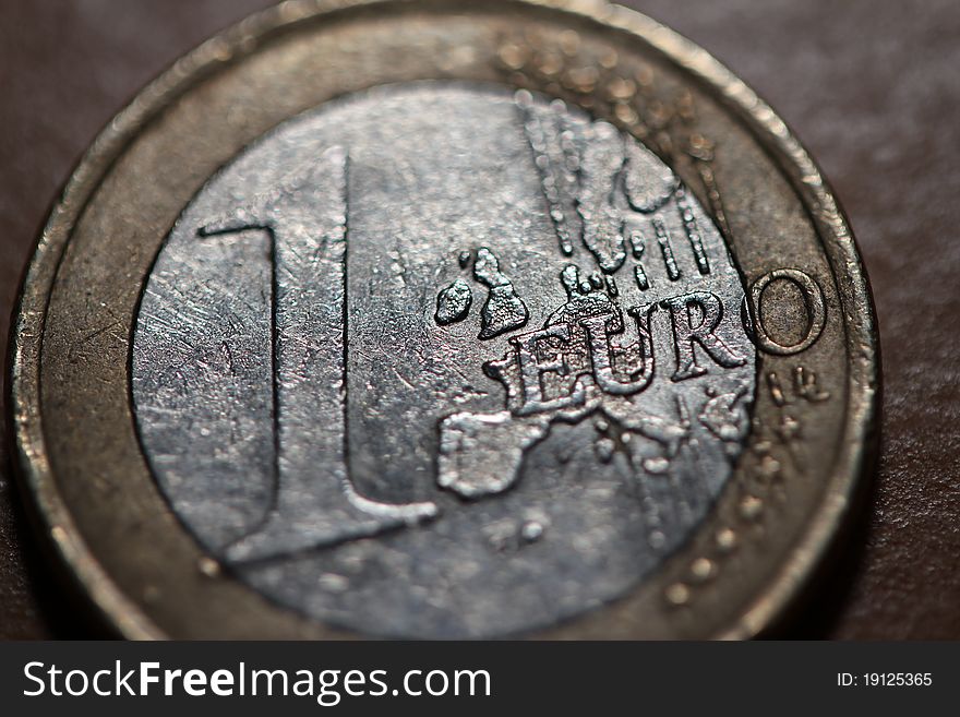 An rugged 1 euro coin