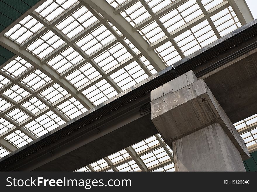 Elevated track of maglev train against the steel and glass ceiling of the maglev station, pudong, shanghai, china. Elevated track of maglev train against the steel and glass ceiling of the maglev station, pudong, shanghai, china