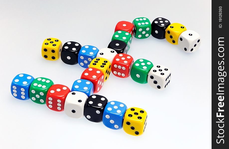 Dice in shape of pound sterling symbol