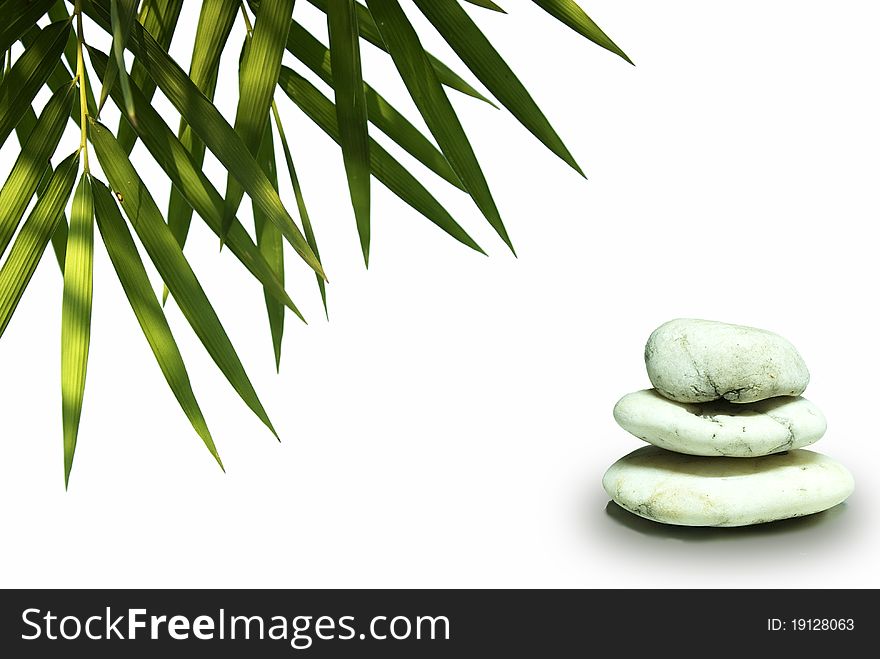 Stones Pyramid On White Background, Green Leaves B
