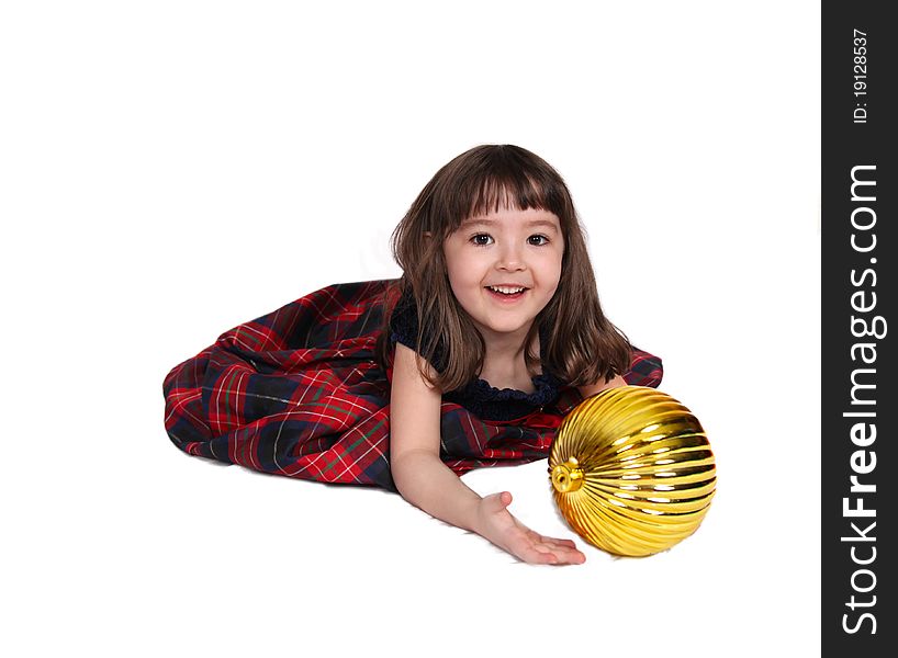 Adorable little girl playing with large christmas bulb isolated on white. Adorable little girl playing with large christmas bulb isolated on white