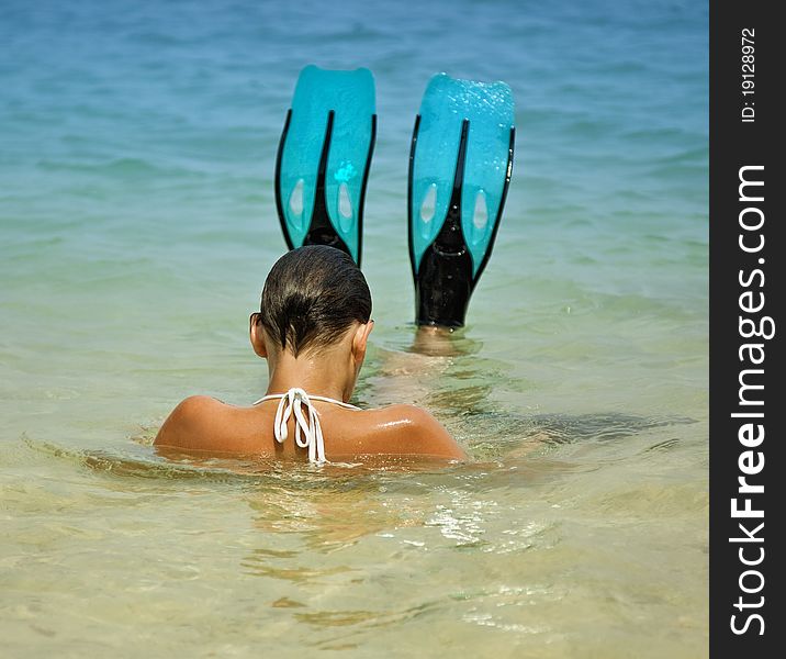 Flippers upswimming woman outdoor photo