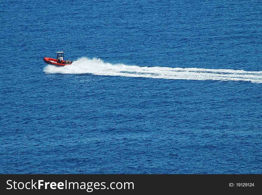 Background of blue water, motor boat on sea