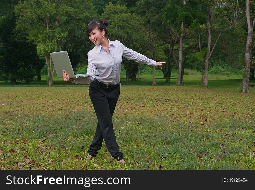 Business Woman Using Laptop Outdoor