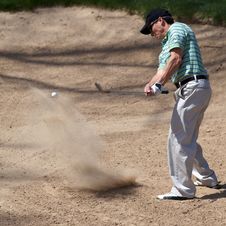 Golfer Hits His Golf Ball Royalty Free Stock Image