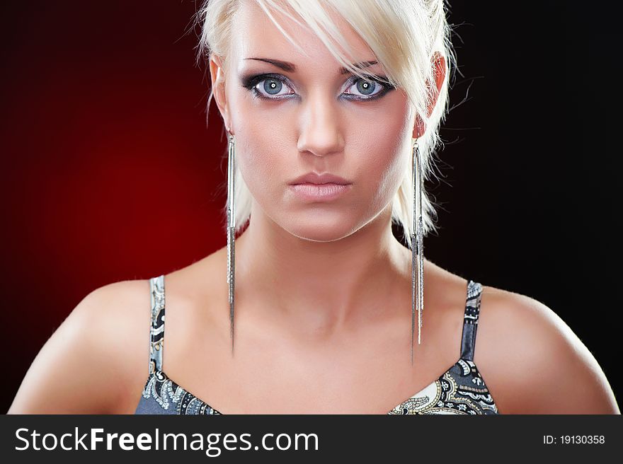 Closeup portrait of an elegant blonde beauty, studio shot