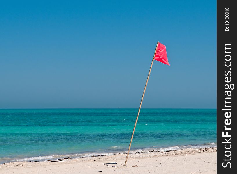 A red flag signals that ocean conditions are dangerous to swimmers. A red flag signals that ocean conditions are dangerous to swimmers