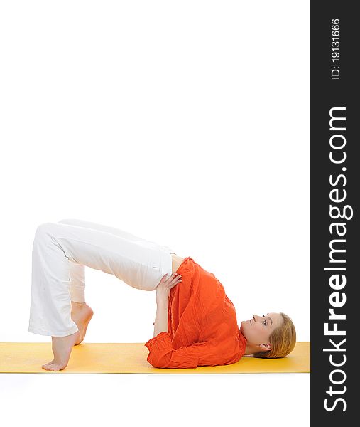 Series or yoga photos. young woman doing yoga pose on yellow pilates mat