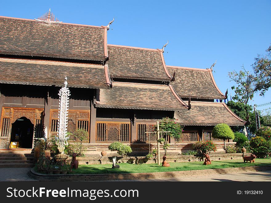 This photo of the architecture is called Wihan in Thai which is usually a large hall building in temple to keep Buddha statues and used for monk's praying ceremony in the daily basis. It is taken at an old temple names Wat lok molee in Chiangmai Thailand.

Wat Lok Moli is notable for its massive chedi, which was built in 1527-8 by King Chettharat. A viharn stands in front of the chedi. Although not particularly old, the viharn is tastefully designed.