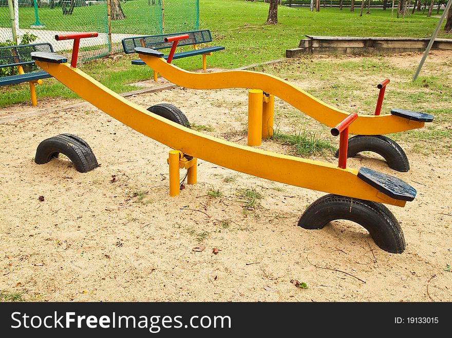 Yellow Seesaw in the Playground