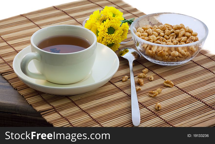 Braekfast with tea and Chrysanthemum isolated on white background. Braekfast with tea and Chrysanthemum isolated on white background