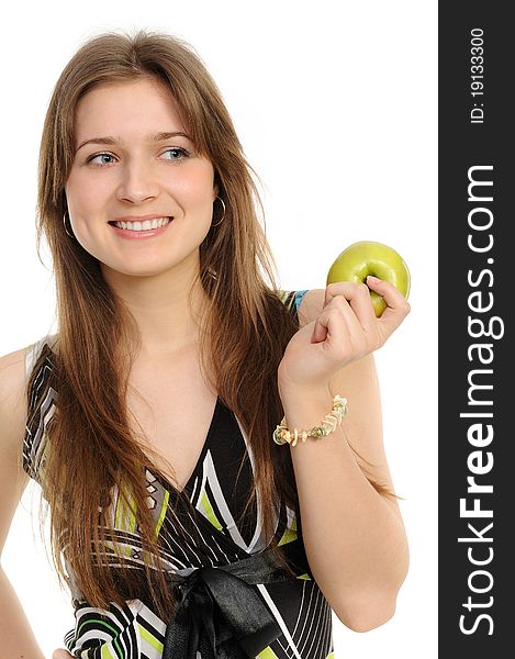 Portrait of cheerful young woman holding a green apple and smiling isolated against white background. Portrait of cheerful young woman holding a green apple and smiling isolated against white background