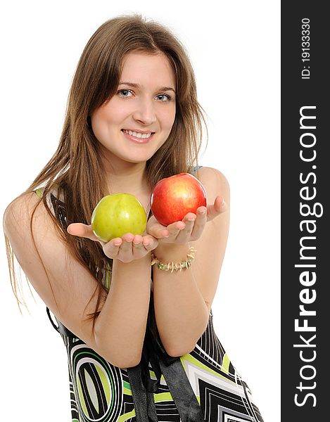 Young woman holding two apples - green and red.