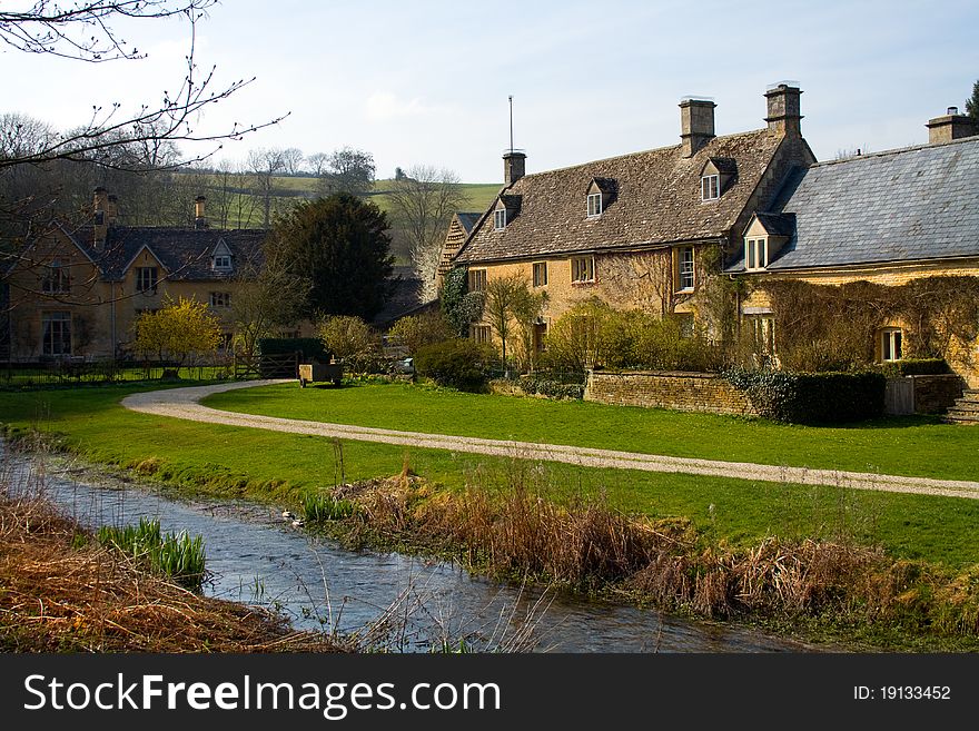 Springtime in a small village besides the river. Springtime in a small village besides the river