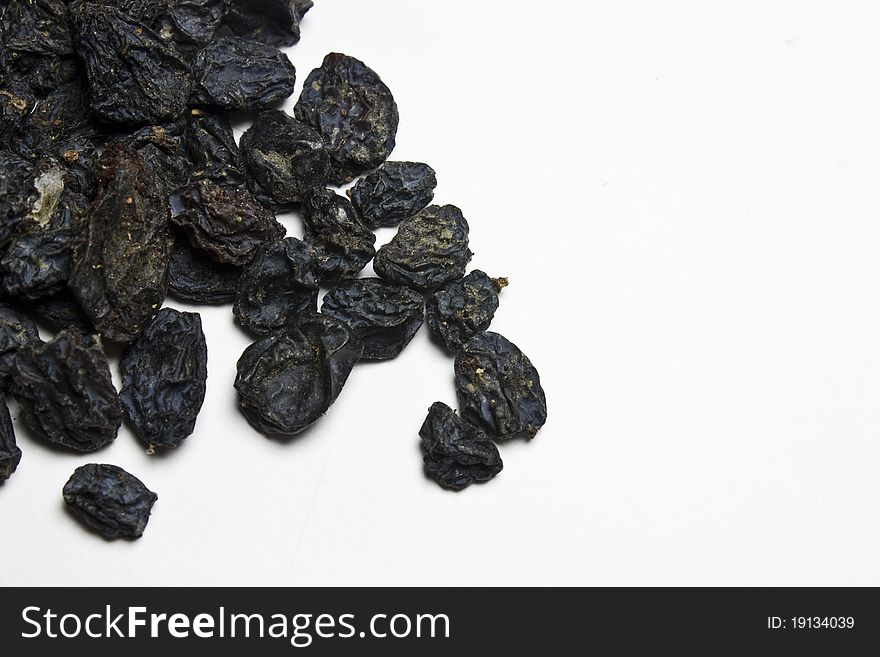 Raisins for healthy diet on white background