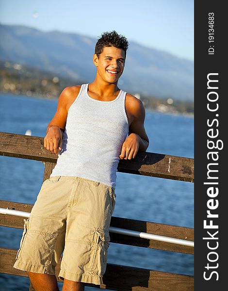 Young man standing on the pier. Young man standing on the pier