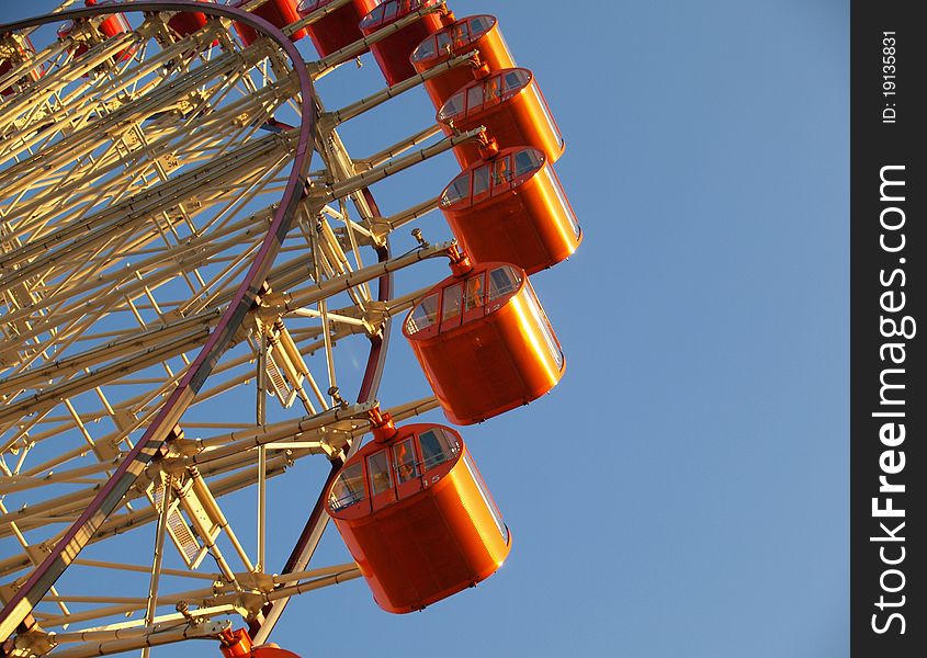 Ferris wheel in the sunset time