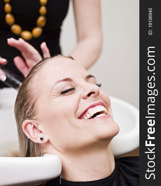 Laughing woman relaxing at the Beauty spa. Laughing woman relaxing at the Beauty spa