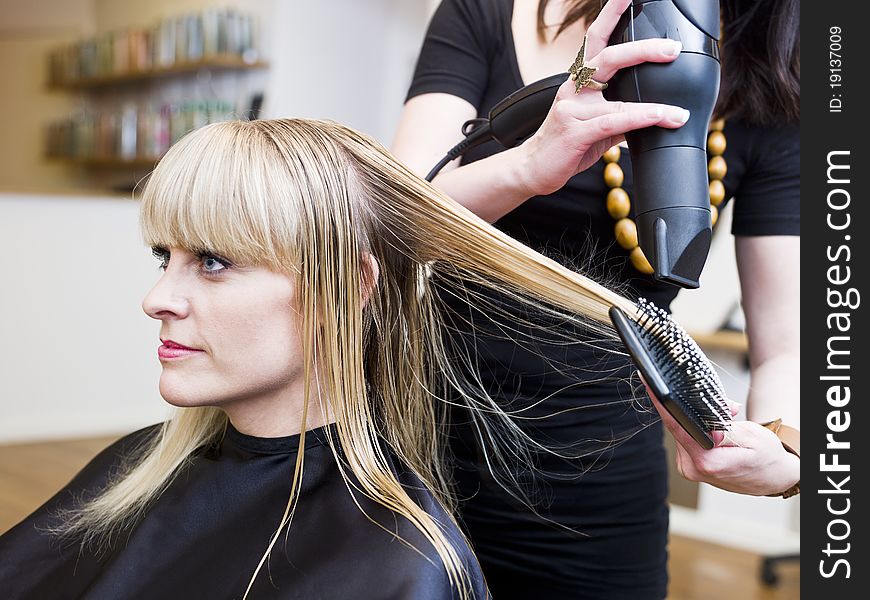 Blond woman at the Hair Salon. Blond woman at the Hair Salon