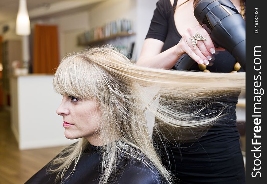 Blond woman at the Hair Salon. Blond woman at the Hair Salon