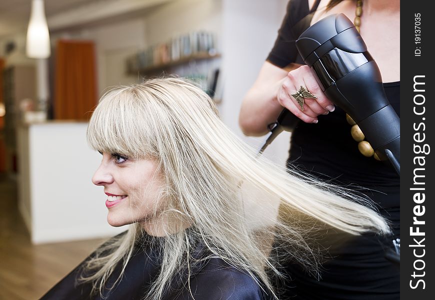 Blond woman at the Hair Salon. Blond woman at the Hair Salon