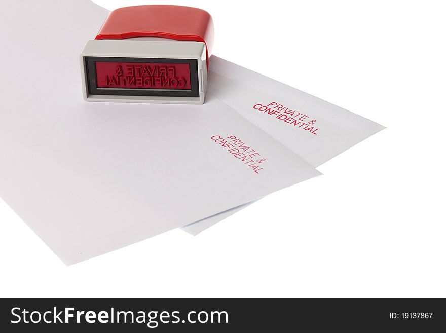 Two envelopes marked private and confidential with ared stamp on them