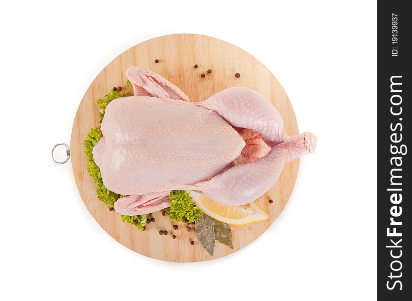Fresh raw chicken and condiments, high angle view, clipping path included