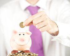 Businessman Saving Money Stock Images