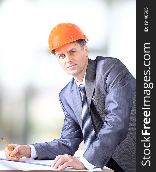 A handsome business construction man on the work site. A handsome business construction man on the work site