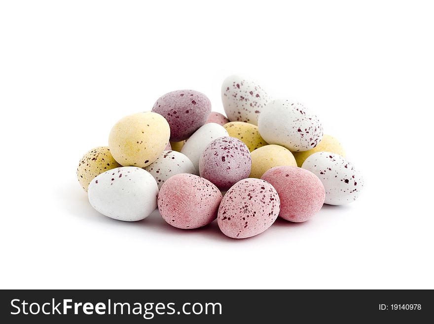 Pile of chocolate easter eggs over a white background. Pile of chocolate easter eggs over a white background