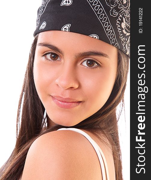 Beautiful woman looking at the camera with a scarf on her head