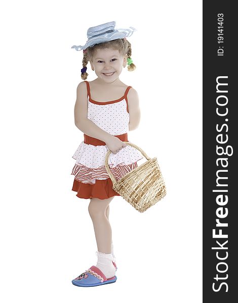 The charming girl in a hat with a basket in a hand. The charming girl in a hat with a basket in a hand.