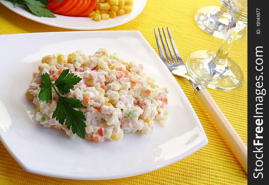 Salad with meat decorated parsley. Salad with meat decorated parsley.