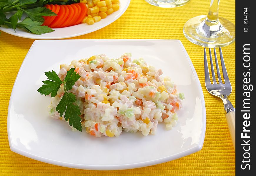 Salad with meat decorated parsley. Salad with meat decorated parsley.