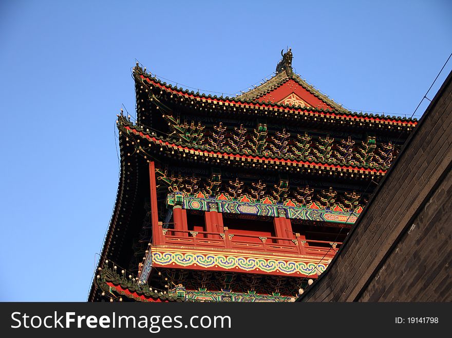 Qianmen (Front Gate) is the colloquial name for Zhengyangmen (meaning gate of the zenith Sun), a gate in Beijing's historic city wall. The gate is situated to the south of Tiananmen Square and once guarded the southern entry into the Inner City. Although much of Beijing's city walls were demolished, Qianmen remains an important geographical marker of the city. The city's central north-south axis passes through Zhengyangmen's main gate. Photo take on: Apr 11, 2011. Qianmen (Front Gate) is the colloquial name for Zhengyangmen (meaning gate of the zenith Sun), a gate in Beijing's historic city wall. The gate is situated to the south of Tiananmen Square and once guarded the southern entry into the Inner City. Although much of Beijing's city walls were demolished, Qianmen remains an important geographical marker of the city. The city's central north-south axis passes through Zhengyangmen's main gate. Photo take on: Apr 11, 2011