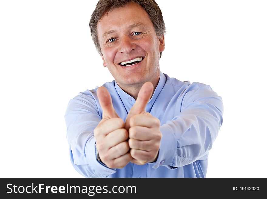 Attractive happy pensioner shows both thumbs up