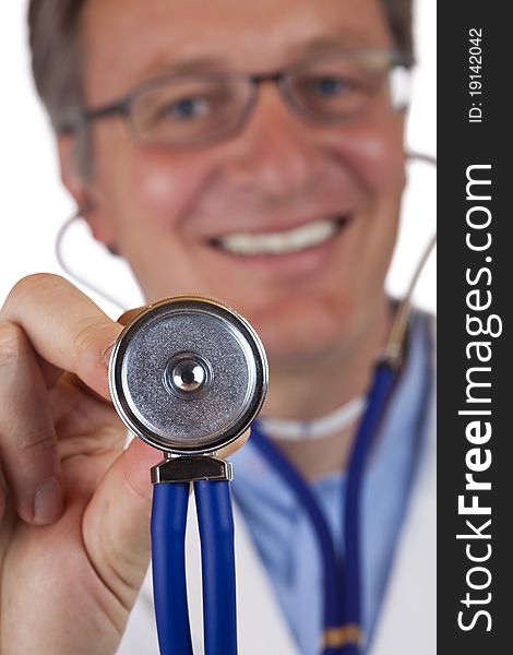 Close-up macro of stethoscope, held by smiling oder male doctor, over white background. Close-up macro of stethoscope, held by smiling oder male doctor, over white background.