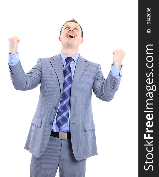 Full length of a handsome business man with hands folded against white background