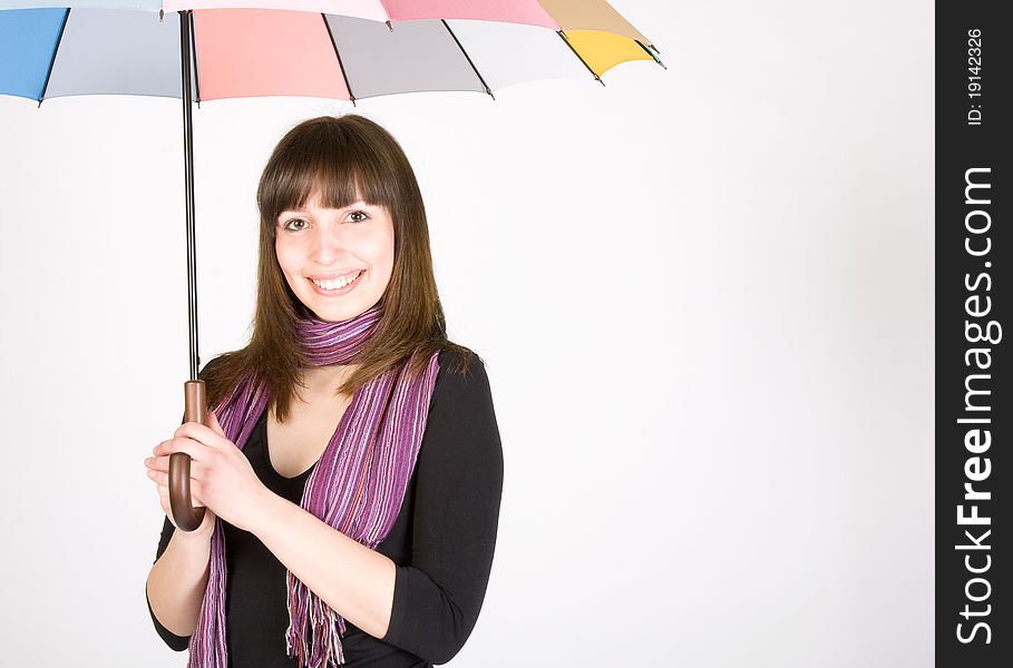 Smiling woman with colorful umbrella. Smiling woman with colorful umbrella