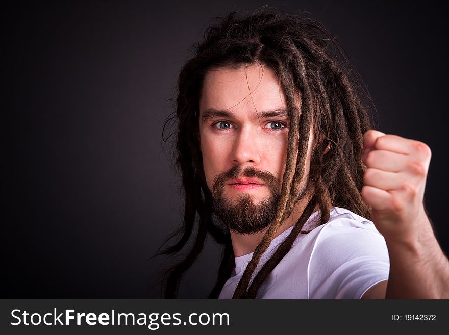 Gay guy with long dreadlocks Posing