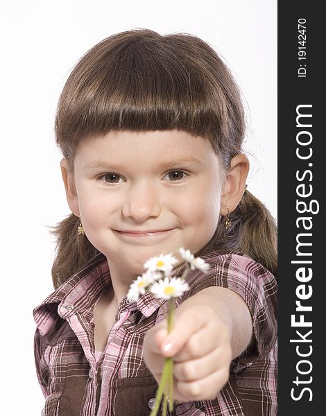 Little girl giving white flowers. Little girl giving white flowers