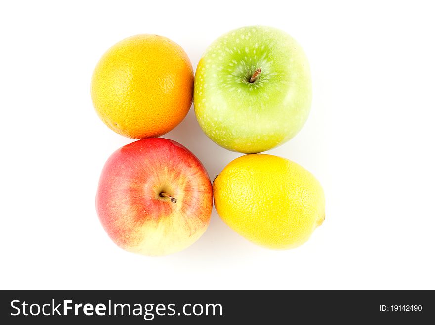 Four different colorful fruits isolated on white. Four different colorful fruits isolated on white