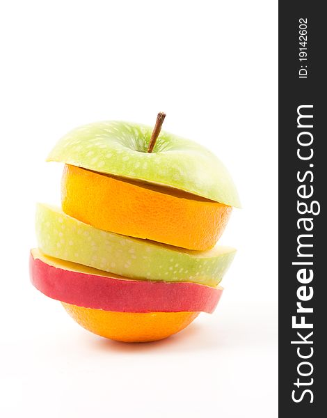 Colorful orange and apple slices in one fruit. Colorful orange and apple slices in one fruit