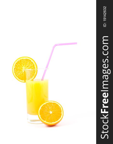 Fresh orange juice in a glass with drinking straw