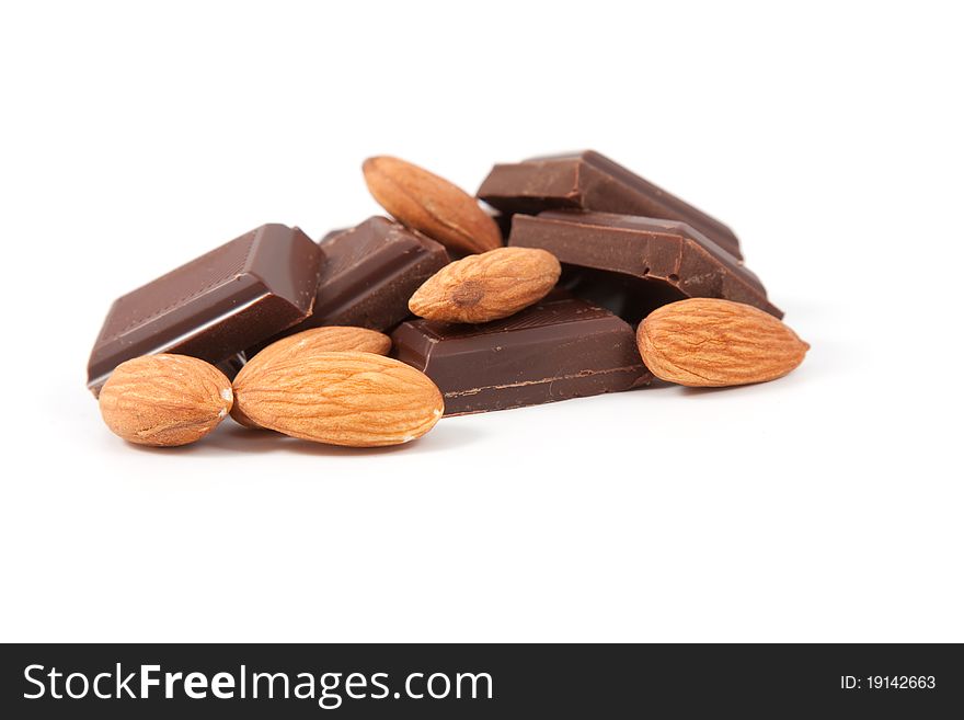 Chocolate bars with almonds isolated on white. Chocolate bars with almonds isolated on white
