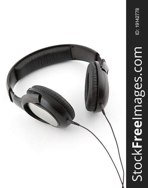 Black modern stereo headphones isolated on white