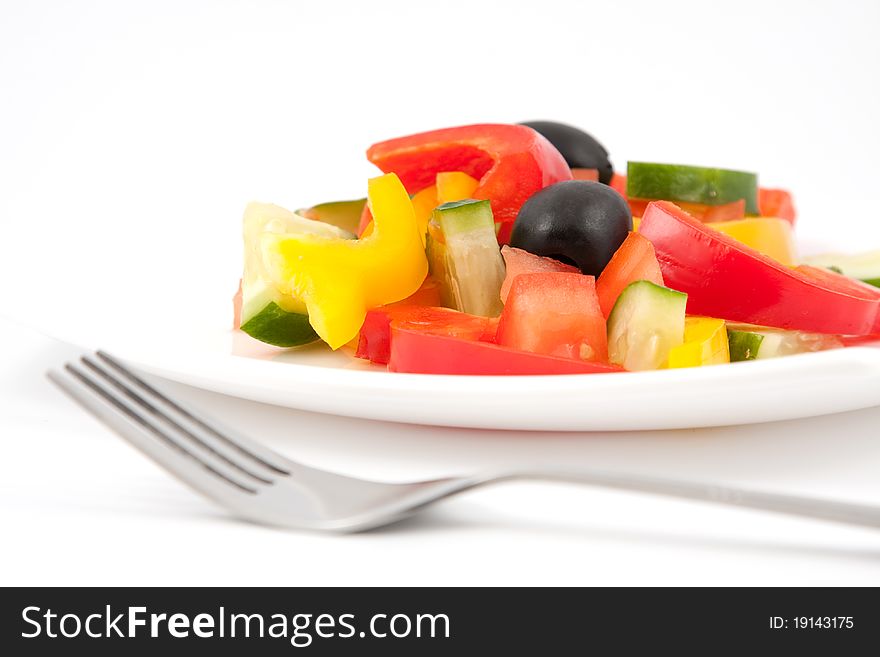 Vegetable salad on white plate