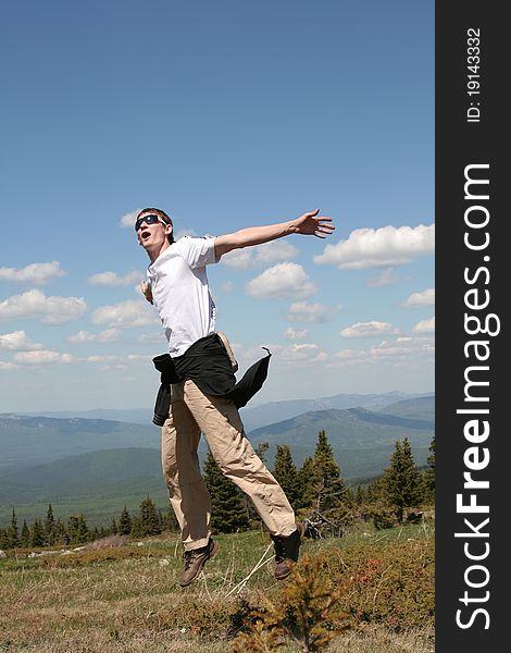 Young man jumping in outdoors. Young man jumping in outdoors