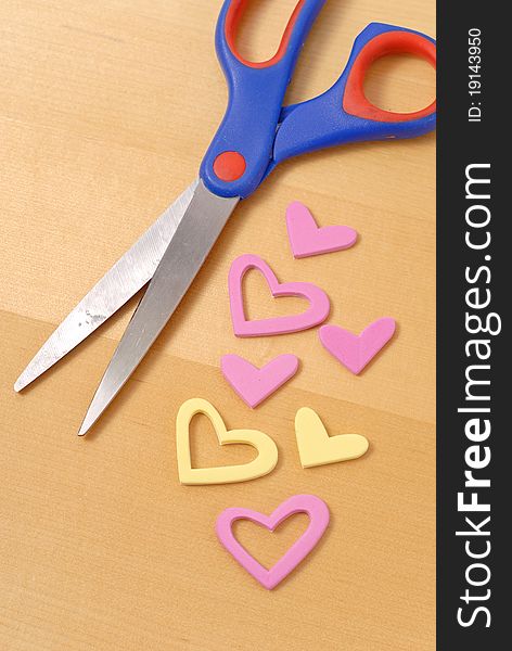 Cutting Out Hearts Next To Scissors